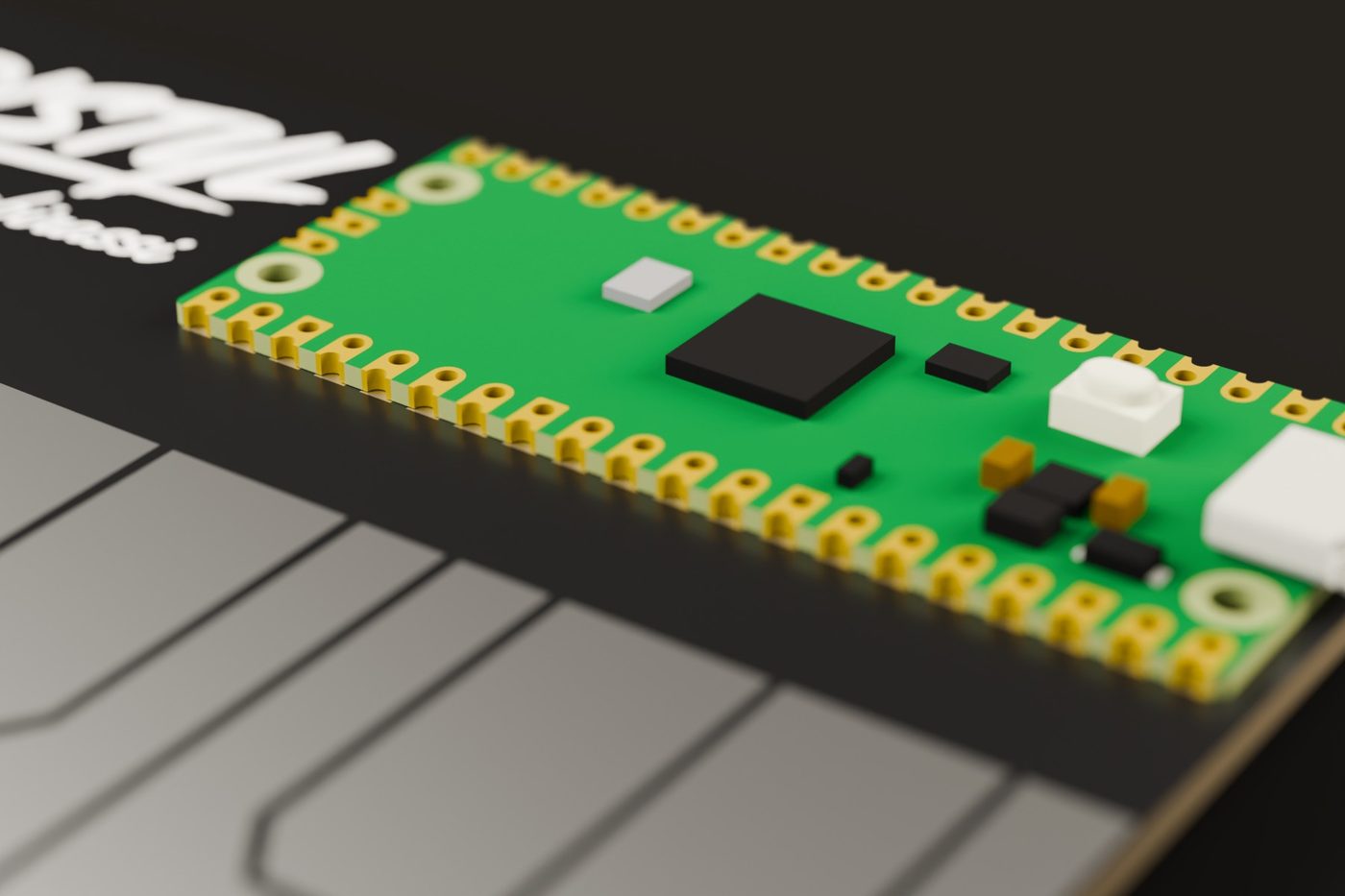 Detalle de la Raspberry Pi Pico y el logo